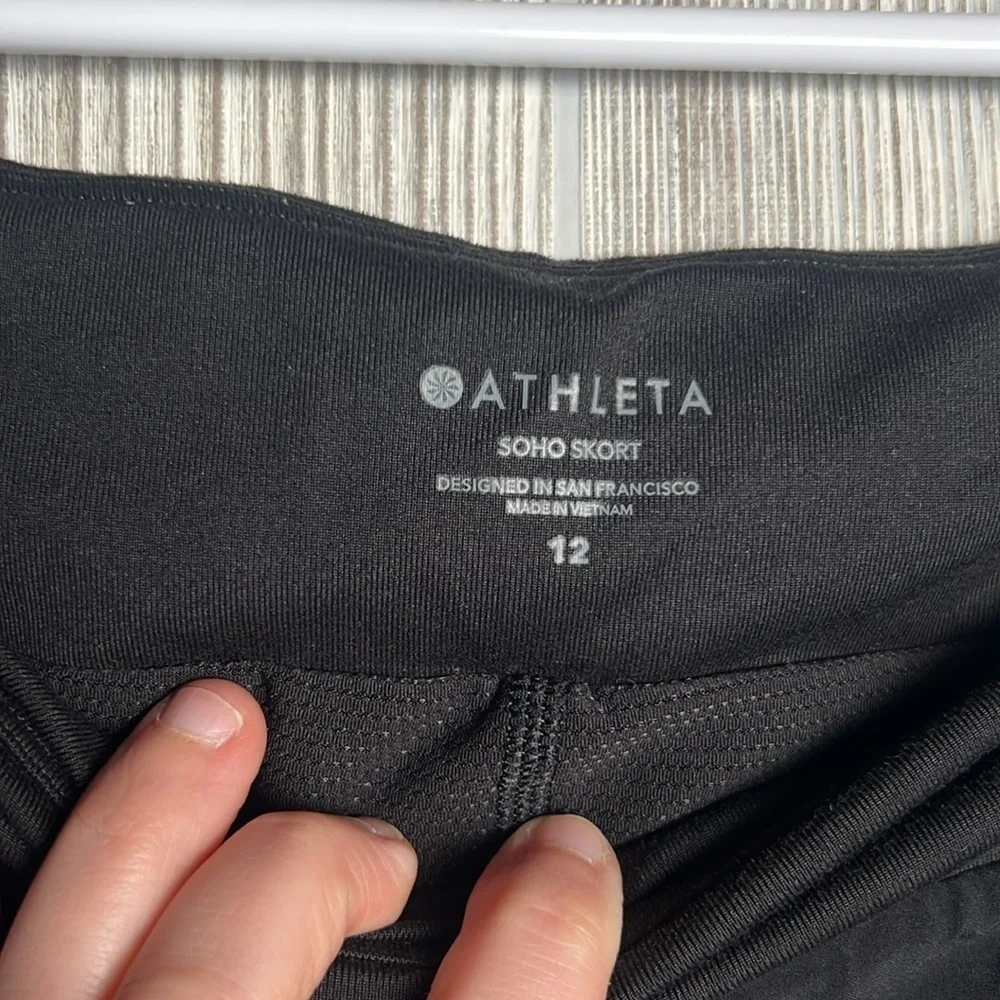 Athleta Black Soho Skort UPF 50 Stretch Womens Size 12 Black Zip Pockets Lined